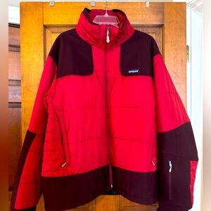 Men’s Patagonia ski jacket. Size large. Interior powder skirt. Red.